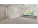 Expansive bedroom with natural light and view of the full en-suite bath at 8724 Peachtree Park Ct, Windermere, FL 34786