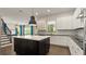 Bright kitchen features a large island, modern appliances, and an open layout at 8724 Peachtree Park Ct, Windermere, FL 34786