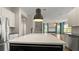 Large kitchen island provides plenty of counter space in this open-concept kitchen at 8724 Peachtree Park Ct, Windermere, FL 34786