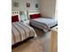 bedroom with two single beds and colorful decor at 8981 Shine Dr, Kissimmee, FL 34747
