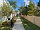 Picturesque walkway with manicured landscaping, providing a serene and inviting ambiance at 8981 Shine Dr, Kissimmee, FL 34747