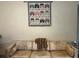 Comfortable living room with couch, floral pillows, and wall decorations at 921 Louisiana Ave, St Cloud, FL 34769