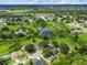 A charming neighborhood with lush green spaces, walking paths, and multiple ponds at 12513 Indiana Woods Ln, Orlando, FL 32824