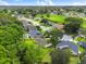 An aerial view showing the neighborhood's neatly planned streets and green spaces at 12513 Indiana Woods Ln, Orlando, FL 32824