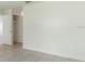 Bright living room featuring neutral paint and tile flooring, offering a blank canvas for personal design at 12513 Indiana Woods Ln, Orlando, FL 32824