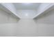 Functional walk-in closet featuring a basic storage solution, ideal for organization and maximizing space at 12513 Indiana Woods Ln, Orlando, FL 32824