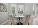 Charming breakfast nook with seating for four and bright window views at 12755 Westside Village Loop, Windermere, FL 34786