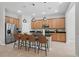 Modern kitchen with stainless steel appliances and a large center island at 12755 Westside Village Loop, Windermere, FL 34786
