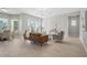 Bright living room featuring hardwood floors, modern lighting, and contemporary furniture at 12755 Westside Village Loop, Windermere, FL 34786