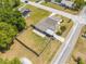 Aerial view of a home, showcasing its fenced yard and proximity to the surrounding neighborhood at 1422 Missouri Ave, St Cloud, FL 34769