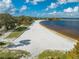 Attractive beach with lush surroundings, perfect for relaxation and outdoor activities by the water at 1422 Missouri Ave, St Cloud, FL 34769