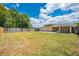 Backyard featuring privacy fence and lush landscaping at 1422 Missouri Ave, St Cloud, FL 34769