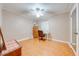 Bedroom featuring hardwood floors, ceiling fan, closet and window for natural lighting at 1422 Missouri Ave, St Cloud, FL 34769