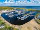 Aerial view of a well-maintained marina with multiple boat slips, offering easy access to the open water at 1422 Missouri Ave, St Cloud, FL 34769