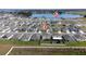 Aerial view showcases the community's proximity to lake and green spaces at 164 Emanuelle Dr, Winter Haven, FL 33884