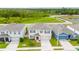 Aerial view of a two-story home with a well-maintained lawn at 164 Emanuelle Dr, Winter Haven, FL 33884