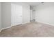 Cozy bedroom featuring carpet and a closet for storage at 164 Emanuelle Dr, Winter Haven, FL 33884