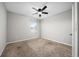 A cozy bedroom with a ceiling fan and natural light coming through the window at 164 Emanuelle Dr, Winter Haven, FL 33884