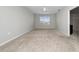 A spacious bedroom with a ceiling fan and natural light coming through the window at 164 Emanuelle Dr, Winter Haven, FL 33884