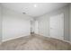 Neutral bedroom featuring carpet, closet, and a blank canvas for personalization at 164 Emanuelle Dr, Winter Haven, FL 33884