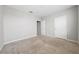 Neutral bedroom featuring carpet, closet, and a blank canvas for personalization at 164 Emanuelle Dr, Winter Haven, FL 33884