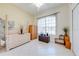 Bright bedroom featuring a large window and neutral color scheme at 1941 Mathis Rd, St Cloud, FL 34771