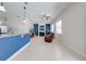 Open living area with tiled flooring, fireplace and lots of natural light at 1941 Mathis Rd, St Cloud, FL 34771