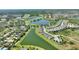 Overhead view of a community with lakes, golf course, and organized residential layout at 1948 Molise Dr, Kissimmee, FL 34759