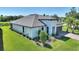 Lovely single-Gathering home with manicured lawn, landscaping, and brick driveway at 1948 Molise Dr, Kissimmee, FL 34759