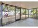 Enclosed porch with views of the yard at 218 Cranbrook Dr, Kissimmee, FL 34758