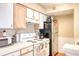 Compact kitchen layout offering essential appliances and counter space at 2203 Key West Ct # 432, Kissimmee, FL 34741