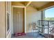 Inviting condo patio with seating and view, perfect for relaxing and enjoying the outdoors at 2203 Key West Ct # 432, Kissimmee, FL 34741