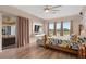 Spacious bedroom with water view and mounted tv provides a comfortable retreat at 2234 Callaway Ct, Davenport, FL 33837
