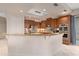 A kitchen features granite countertops, stainless steel appliances, and plenty of cabinets for storage at 2234 Callaway Ct, Davenport, FL 33837