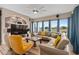This living room has a large window, comfortable seating and elegant decor at 2234 Callaway Ct, Davenport, FL 33837
