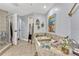 Bathroom featuring glass enclosed shower, soaking tub with decor and beach themed art at 2403 S Atlantic Ave # 501, Daytona Beach Shores, FL 32118