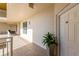 Building hallway featuring unit door, covered walkways, and views of the area at 2403 S Atlantic Ave # 501, Daytona Beach Shores, FL 32118