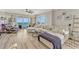 Bright living room with floor-to-ceiling windows offering stunning ocean views and comfortable seating at 2403 S Atlantic Ave # 501, Daytona Beach Shores, FL 32118