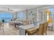 Inviting living room with ocean views, comfortable seating, stylish decor, and ample natural light at 2403 S Atlantic Ave # 501, Daytona Beach Shores, FL 32118