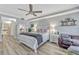 Spacious main bedroom with wood floors, ensuite bathroom and sitting area with ocean views at 2403 S Atlantic Ave # 501, Daytona Beach Shores, FL 32118
