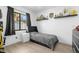 Bright bedroom with a single bed, a window, and decorative shelving, perfect for a room at 2506 Bali Cir, Kissimmee, FL 34741