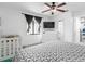This stylish bedroom features an abundance of natural light and fresh white paint at 2506 Bali Cir, Kissimmee, FL 34741