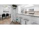 Beautiful eat-in kitchen with stainless steel appliances, granite countertops and a breakfast bar at 2506 Bali Cir, Kissimmee, FL 34741