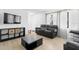 Bright living room features sleek furnishings and a comfortable seating area at 2506 Bali Cir, Kissimmee, FL 34741