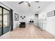 Spacious living area with sliding glass doors to lanai and open access to kitchen and dining at 2506 Bali Cir, Kissimmee, FL 34741