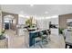 Stylish kitchen island with bar seating, ample storage, and modern finishes, perfect for entertaining guests at 2874 Turnstone Run, Harmony, FL 34773