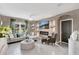 Cozy living room featuring a modern fireplace, built-in shelving, and comfortable seating, great for relaxation at 2874 Turnstone Run, Harmony, FL 34773