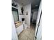 Bathroom features a shower, toilet, and sink with vanity at 3171 Santa Cruz Dr, Kissimmee, FL 34746