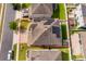 Aerial view of home, solar panels, backyard with artificial turf, paver patio and fenced yard at 3252 Toscana Dr, St Cloud, FL 34772