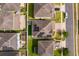 Aerial view of neighborhood homes with solar panels and well-maintained yards at 3252 Toscana Dr, St Cloud, FL 34772